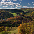 Valley at Barnet Center Vermont with hills touched by Fall color