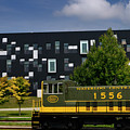 Yellow green historic Waterloo Central Railway train car with mo